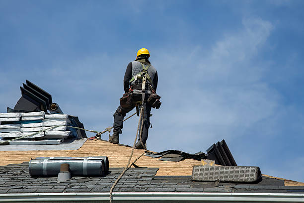 Professional Roof Replacement technician working in Trego, MT